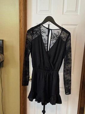 bebe Black Lace Sleeve Romper